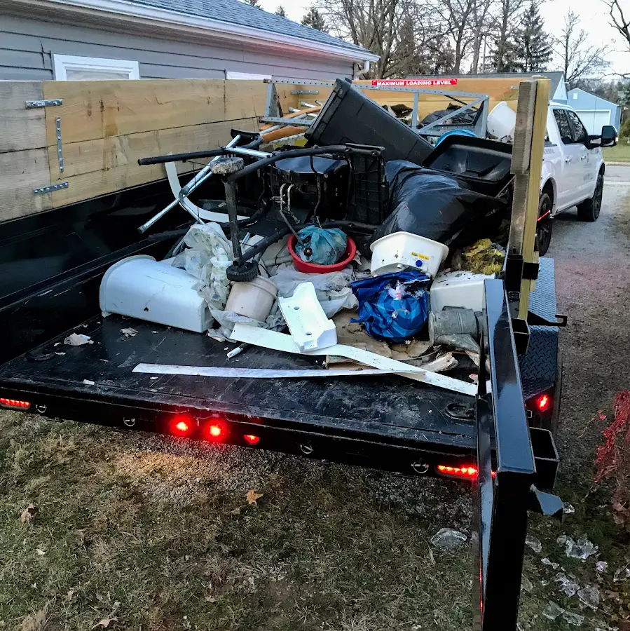 Roll-off dumpster delivered to a residential driveway in St. Robert